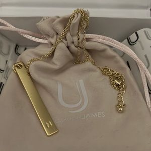 Uncommon James gold initial necklace.